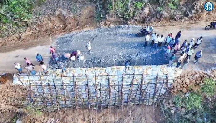 அரூர் அருகே 10 ஆயிரம் மணல் மூட்டைகள் அடுக்கி மலைப்பாதை சீரமைப்பு